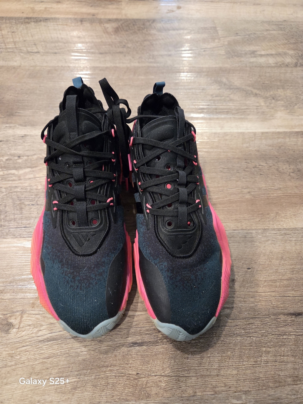 Adidas Trae Young 3 basketball shoe in the "Arctic Night/Core Black/Acid Orange"